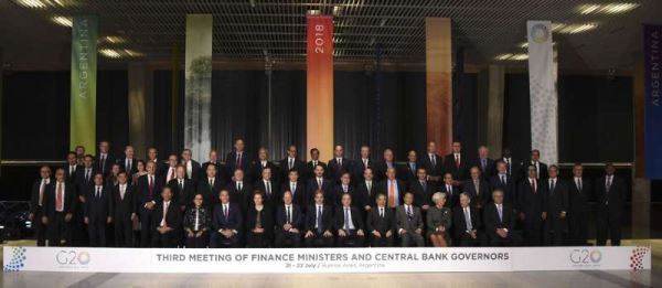 Family picture of Finance Ministers and Central Bank Governors of the G20, during their meeting in Buenos Aires, on July 21, 2018 [Photo: AFP/Eitan Abramovich]
