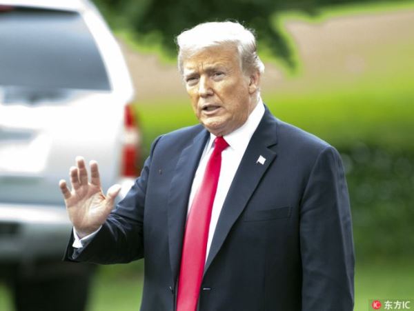 United States President Donald J. Trump waves to the press as he departs the South Lawn of the White House in Washington, DC for a short trip to Tampa, Florida on Tuesday, July 31, 2018. [Photo: IC] 